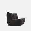 En plyschig, mörkgrå Mod 3 Movie Couch från myke møbler visas i profil mot en vanlig vit bakgrund, med en lågprofilerad, armlös design med tuftad, stoppad klädsel för en elegant modulær sofflook.